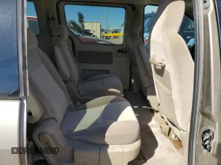 2006 Ford Freestar SE z VIN 2FMZA51696BA52749, wystawiony jako Copart lot #73174604 z przebiegiem 288 365 mil mil oraz Szkody całkowita. Historia ofert i sprzedaży dostępna na DreamBid. Obrazek 11.