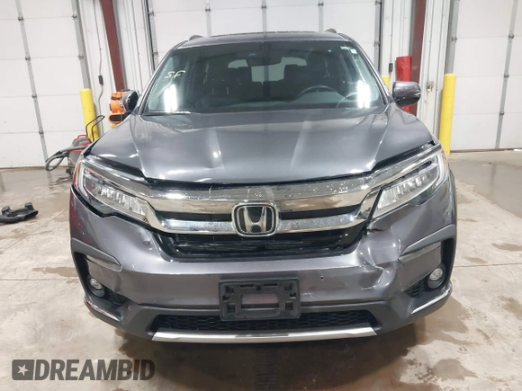 2019 Honda Pilot Touring 7-Passenger с VIN 5FNYF6H68KB082089, выставлен на аукционе IAAI как лот 42616148 с пробегом 69 913 миль миль и . История ставок и продаж доступна на DreamBid. Изображение 13.