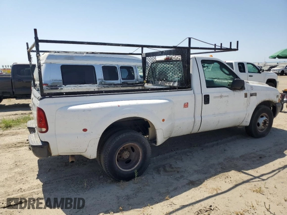 2003 Ford F-350 with VIN 1FTWF32S33EC43270, listed as a Copart auction lot 58818025 with 303,533 mi miles and Clean title. Bid and sale history available at DreamBid. Image 3.