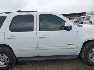 2011 Chevrolet Tahoe LT with VIN 1GNSCBE0XBR256687, listed as a IAAI auction lot 41948765 with 232,954 mi miles and . Bid and sale history available at DreamBid. Image 13.