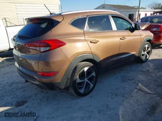 2016 Hyundai Tucson Limited with VIN KM8J33A29GU105194, listed as a IAAI auction lot 41214305 with 65,452 mi miles. Bid and sale history available at carsss.com. Image 4.