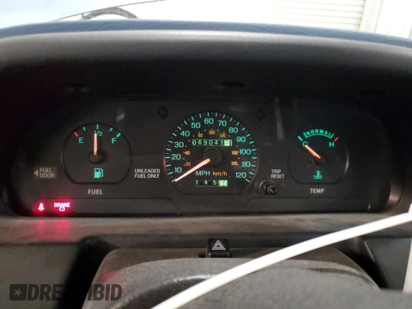 1994 Ford Escort z VIN 1FARP14J9RW318226, wystawiony jako Copart lot #60507135 z przebiegiem 69 041 mil mil oraz Szkoda całkowita • Salvage title. Historia ofert i sprzedaży dostępna na DreamBid. Obrazek 9.