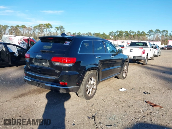 2014 Jeep Grand Cherokee Summit with VIN 1C4RJEJG1EC130727, listed as a IAAI auction lot 41269066 with 205,914 mi miles and . Bid and sale history available at DreamBid. Image 4.