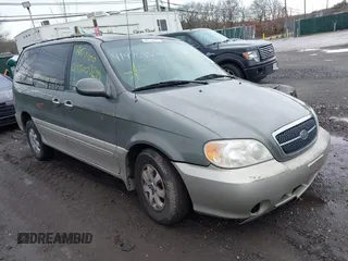 2005 Kia Sedona LX with VIN KNDUP132756687577, listed as a IAAI auction lot 41970855 with Not Provided miles and . Bid and sale history available at DreamBid. Image 1.