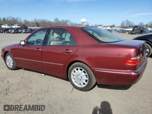 2000 Mercedes-Benz E-Class with VIN WDBJF65J6YB052254, listed as a Copart auction lot 49375555 with 96,015 mi miles and Salvage Title. Bid and sale history available at carsss.com. Image 2.
