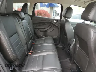 2015 Ford Escape Titanium with VIN 1FMCU0JX5FUA24210, listed as a Copart auction lot 57270855 with 115,613 mi miles and Salvage title. Bid and sale history available at DreamBid. Image 11.