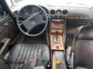 1985 Mercedes-Benz 380 z VIN WDBBA45C8FA035077, wystawiony jako Copart lot #57941015 z przebiegiem 127 403 mil mil oraz Tytuł czysty. Historia ofert i sprzedaży dostępna na DreamBid. Obrazek 8.