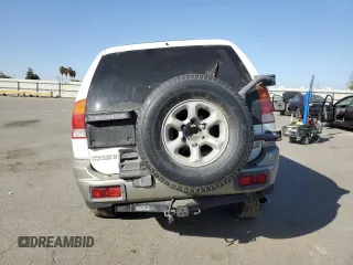 1997 Mitsubishi Montero LS z VIN JA4MT31P8VP005560, wystawiony jako Copart lot #75928354 z przebiegiem 187 136 mil mil oraz Szkoda całkowita • Salvage title. Historia ofert i sprzedaży dostępna na DreamBid. Obrazek 6.