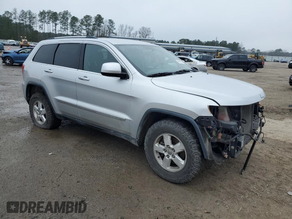 2012 Jeep Grand Cherokee Laredo with VIN 1C4RJFAG2CC294202, listed as a Copart auction lot 44918715 with 104,605 mi miles and Salvage Title. Bid and sale history available at carsss.com. Image 4.