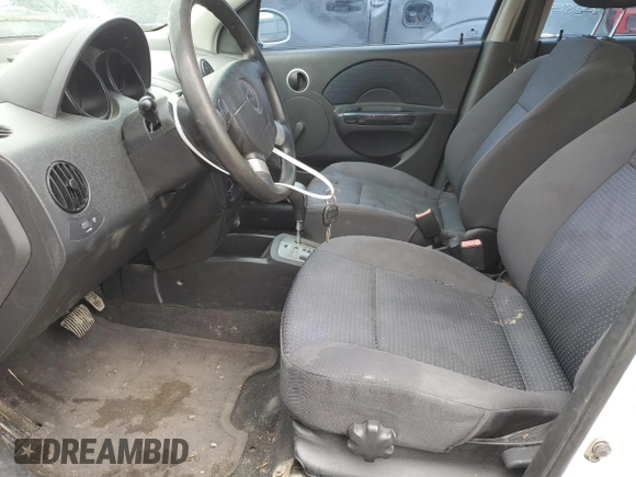 2007 Chevrolet Aveo LS with VIN KL1TD66657B722344, listed as a Copart auction lot 52046095 with 165,798 mi miles and Salvage title. Bid and sale history available at DreamBid. Image 7.