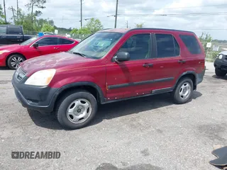 2002 Honda CR-V LX with VIN JHLRD68442C011268, listed as a IAAI auction lot 41962057 with 149,209 mi miles and . Bid and sale history available at carsss.com. Image 2.