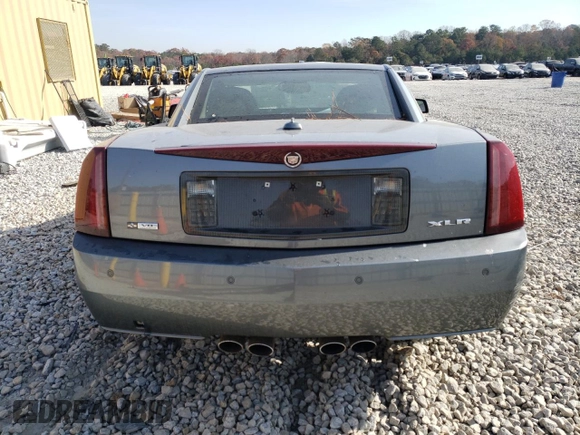 2004 Cadillac XLR z VIN 1G6YV34A845603654, wystawiony jako Copart lot #83494824 z przebiegiem 89 609 mil mil oraz Szkoda całkowita • Salvage title. Historia ofert i sprzedaży dostępna na DreamBid. Obrazek 6.
