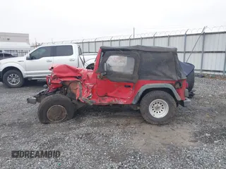 1997 Jeep Wrangler Sport z VIN 1J4FY19S2VP426553, wystawiony jako IAAI lot #41917764 z przebiegiem 154 140 mil mil oraz . Historia ofert i sprzedaży dostępna na DreamBid. Obrazek 14.