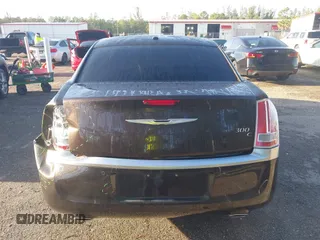 2012 Chrysler 300 C Luxury Series with VIN 2C3CCAPT3CH251755, listed as a IAAI auction lot 41935653 with 62,397 mi miles and . Bid and sale history available at carsss.com. Image 17.