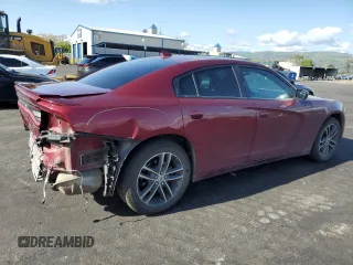 2019 Dodge Charger SXT with VIN 2C3CDXJG4KH757928, listed as a Copart auction lot 51670565 with 93,406 mi miles and Salvage Title. Bid and sale history available at DreamBid. Image 3.