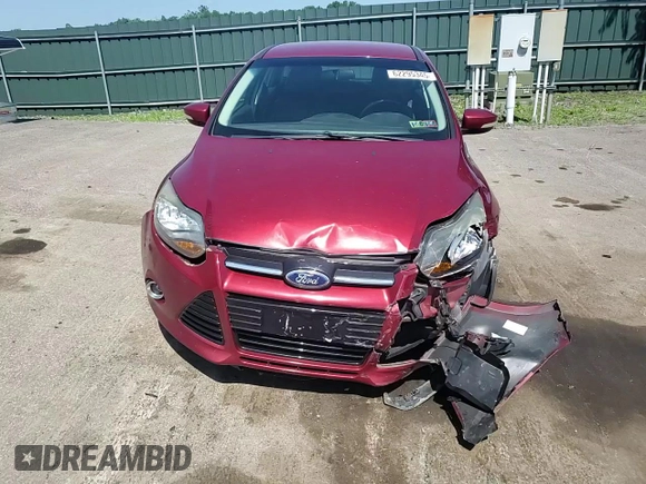 2014 Ford Focus Titanium z VIN 1FADP3N29EL409568, wystawiony jako Copart lot #62295345 z przebiegiem 53 401 mil mil oraz Szkoda całkowita • Salvage title. Historia ofert i sprzedaży dostępna na DreamBid. Obrazek 13.