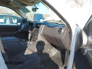 2010 Ford Explorer Sport Trac XLT z VIN 1FMEU3BE4AUA31407, wystawiony jako IAAI lot #41771678 z przebiegiem 105 988 mil mil oraz . Historia ofert i sprzedaży dostępna na DreamBid. Obrazek 5.