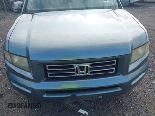2006 Honda Ridgeline RTL with VIN 2HJYK16526H531884, listed as a IAAI auction lot 42796524 with 334,489 mi miles and . Bid and sale history available at DreamBid. Image 6.