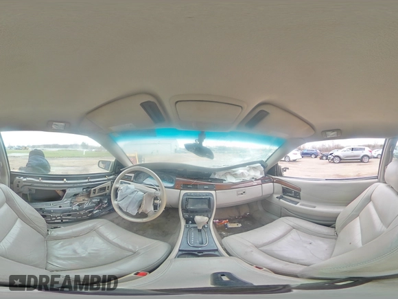 2000 Cadillac Eldorado with VIN 1G6EL12Y5YU166723, listed as a Copart auction lot 82612034 with 80,839 mi miles and Salvage title. Bid and sale history available at DreamBid. Image 13.