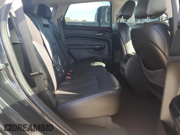 2015 Cadillac SRX Luxury Collection z VIN 3GYFNBE36FS608322, wystawiony jako Copart lot #88860835 z przebiegiem 141 627 mil mil oraz Szkoda całkowita • Salvage title. Historia ofert i sprzedaży dostępna na DreamBid. Obrazek 11.