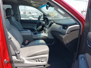 2015 Chevrolet Tahoe LT with VIN 1GNSKBKC6FR628355, listed as a IAAI auction lot 42159743 with 95,730 mi miles and . Bid and sale history available at DreamBid. Image 5.