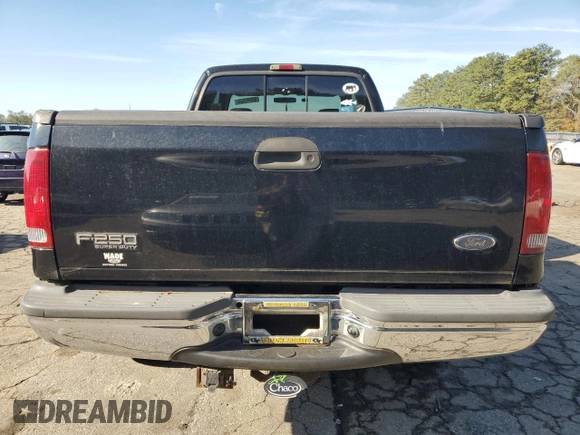 2002 Ford Super Duty F-250 XL with VIN 1FTNX21SX2EC00757, listed as a Copart auction lot 80952634 with 249,650 mi miles and Clean Title. Bid and sale history available at carsss.com. Image 6.