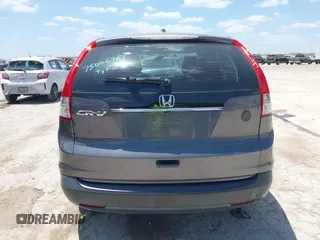 2013 Honda CR-V LX with VIN 3CZRM3H37DG708916, listed as a IAAI auction lot 42450090 with 118,002 mi miles and . Bid and sale history available at DreamBid. Image 16.