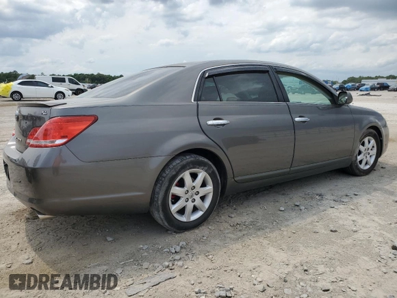 2007 Toyota Avalon XL z VIN 4T1BK36B67U191919, wystawiony jako Copart lot #56274055 z przebiegiem 188 679 mil mil oraz Szkoda całkowita • Salvage title. Historia ofert i sprzedaży dostępna na DreamBid. Obrazek 3.