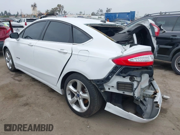 2014 Ford Fusion SE Hybrid with VIN 3FA6P0LU0ER189444, listed as a IAAI auction lot 42291020 with 187,148 mi miles and . Bid and sale history available at DreamBid. Image 3.