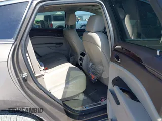 2015 Cadillac SRX Performance Collection with VIN 3GYFNCE31FS598109, listed as a IAAI auction lot 41788267 with 172,488 mi miles and . Bid and sale history available at DreamBid. Image 8.