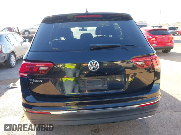 2021 Volkswagen Tiguan SE z VIN 3VV3B7AX0MM080853, wystawiony jako IAAI lot #42406539 z przebiegiem 73 295 mil mil oraz . Historia ofert i sprzedaży dostępna na DreamBid. Obrazek 17.
