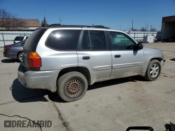 2005 GMC Envoy SLE with VIN 1GKDT13S652171203, listed as a Copart auction lot 49087815 with 292,815 mi miles and Salvage Title. Bid and sale history available at carsss.com. Image 3.
