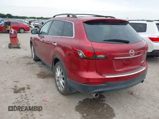 2015 Mazda CX-9 Grand Touring with VIN JM3TB2DA6F0460785, listed as a IAAI auction lot 42474705 with 62,202 mi miles and . Bid and sale history available at DreamBid. Image 3.