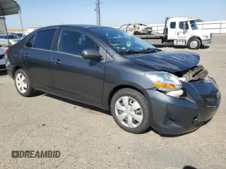 2009 Toyota Yaris z VIN JTDBT903891317448, wystawiony jako Copart lot #56153315 z przebiegiem 209 441 mil mil oraz Szkoda całkowita • Salvage title. Historia ofert i sprzedaży dostępna na DreamBid. Obrazek 4.