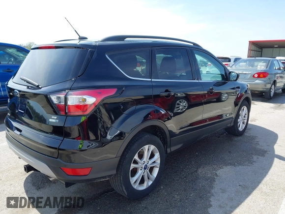 2017 Ford Escape SE with VIN 1FMCU9GD4HUE72510, listed as a IAAI auction lot 41932364 with 115,991 mi miles. Bid and sale history available at carsss.com. Image 4.