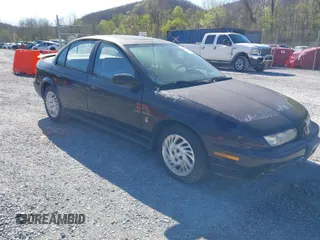 1999 Saturn SL with VIN 1G8ZK5274XZ333729, listed as a IAAI auction lot 41987885 with Not Provided miles. Bid and sale history available at carsss.com. Image 1.