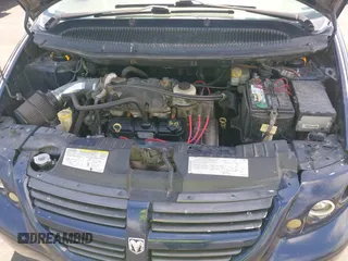 2005 Dodge Caravan SXT with VIN 1D8GP45R65B280660, listed as a IAAI auction lot 42169027 with 246,407 mi miles and . Bid and sale history available at carsss.com. Image 10.