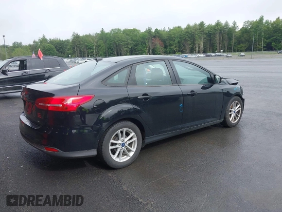 2017 Ford Focus SE with VIN 1FADP3F23HL293741, listed as a IAAI auction lot 42458992 with 85,686 mi miles and . Bid and sale history available at DreamBid. Image 4.
