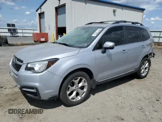 2017 Subaru Forester Touring z VIN JF2SJATC9HH812042, wystawiony jako Copart lot #59775235 z przebiegiem 146 779 mil mil oraz Szkody całkowita. Historia ofert i sprzedaży dostępna na DreamBid. Obrazek 1.