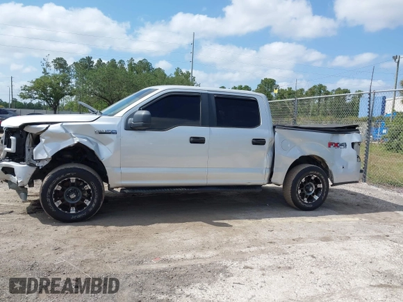 2019 Ford F-150 XL with VIN 1FTEW1E55KKC58276, listed as a IAAI auction lot 42133235 with 97,032 mi miles. Bid and sale history available at carsss.com. Image 14.