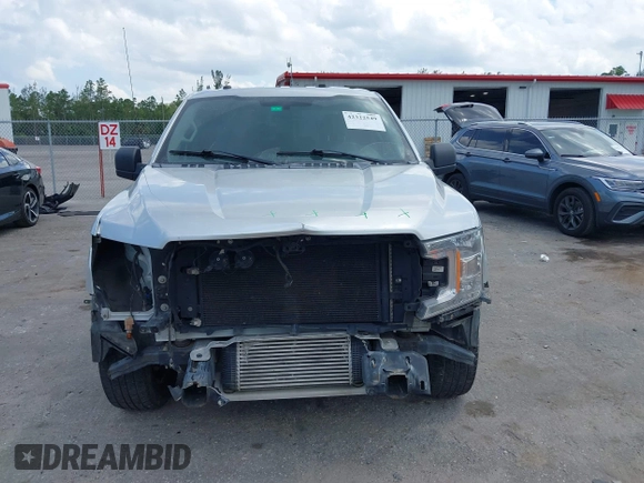 2018 Ford F-150 XL with VIN 1FTEW1CP6JFA35949, listed as a IAAI auction lot 42322549 with 104,044 mi miles and . Bid and sale history available at DreamBid. Image 13.