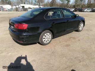 2014 Volkswagen Jetta Sedan S with VIN 3VW2K7AJ5EM310715, listed as a IAAI auction lot 41843290 with 257,801 mi miles. Bid and sale history available at carsss.com. Image 4.