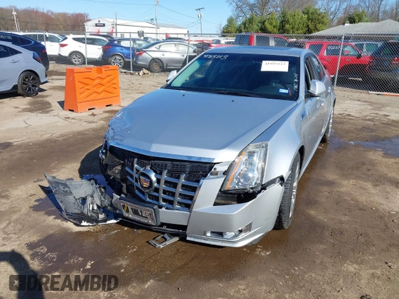 2013 Cadillac CTS Premium with VIN 1G6DP5E39D0100975, listed as a IAAI auction lot 41915113 with 110,436 mi miles and . Bid and sale history available at DreamBid. Image 16.