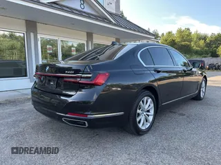 2022 BMW 7 Series 740i xDrive with VIN WBA7T4C06NCK78073, listed as a IAAI auction lot 42783922 with 104,432 mi miles and . Bid and sale history available at DreamBid. Image 4.
