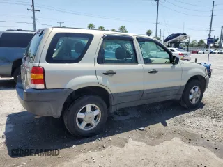 2004 Ford Escape with VIN 1FMCU02184KB21677, listed as a Copart auction lot 58401445 with 102,508 mi miles and Salvage title. Bid and sale history available at DreamBid. Image 3.