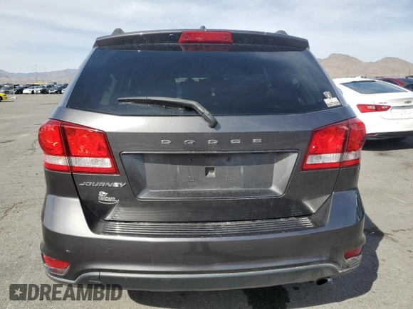 2019 Dodge Journey SE with VIN 3C4PDCBB2KT821156, listed as a Copart auction lot 45925665 with 93,045 mi miles and Salvage Title. Bid and sale history available at DreamBid. Image 6.