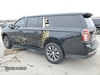 2021 Chevrolet Suburban LS with VIN 1GNSCBKD0MR379571, listed as a Copart auction lot 42579275 with 146,655 mi miles and Salvage Title. Bid and sale history available at DreamBid. Image 2.