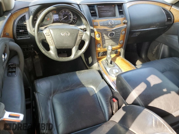 2012 Infiniti QX56 8-passenger with VIN JN8AZ2ND0C9715849, listed as a Copart auction lot 76386714 with 215,768 mi miles and Salvage Title. Bid and sale history available at carsss.com. Image 8.