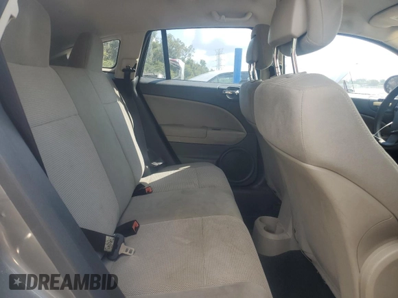 2011 Dodge Caliber Mainstreet z VIN 1B3CB3HA1BD237714, wystawiony jako Copart lot #57713635 z przebiegiem 147 998 mil mil oraz Szkody całkowita. Historia ofert i sprzedaży dostępna na DreamBid. Obrazek 10.