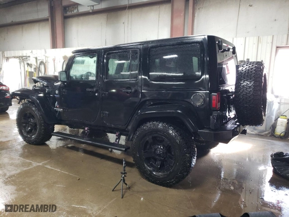 2015 Jeep Wrangler Unlimited Rubicon Hard Rock with VIN 1C4HJWFG4FL676868, listed as a Copart auction lot 48489525 with 100,771 mi miles and Salvage Title. Bid and sale history available at carsss.com. Image 2.